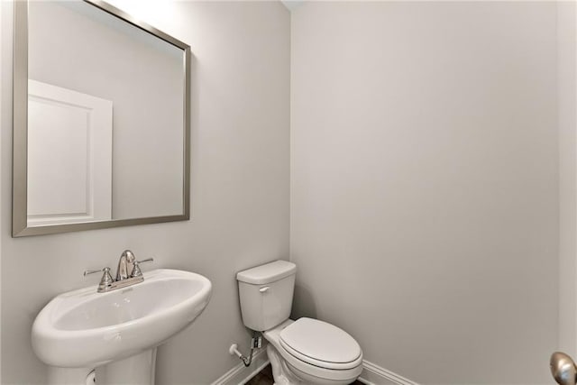 392 Brookstone Trl, Dawsonville, GA 30534 - half bath with baseboards, a sink, and toilet