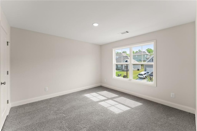392 Brookstone Trl, Dawsonville, GA 30534 - spare room featuring baseboards, carpet floors, and visible vents