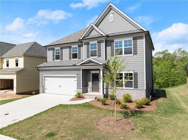 392 Brookstone Trl, Dawsonville, GA 30534 - craftsman-style home with a garage, driveway, brick siding, and a front yard