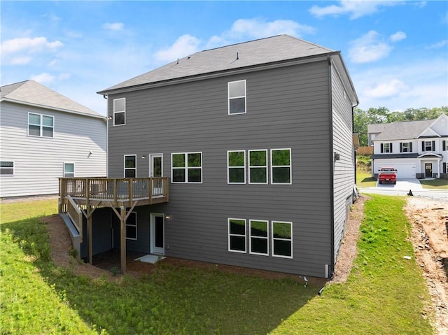 392 Brookstone Trl, Dawsonville, GA 30534 - back of property with a lawn and a wooden deck