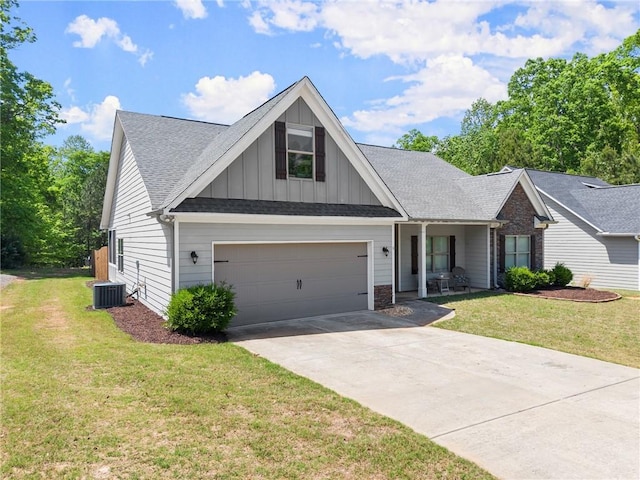 4381 Highland Gate Parkway, Gainesville, GA 30506 - view of front of property featuring a shingled roof, board and batten siding, concrete driveway, and a front lawn