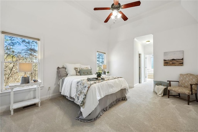 224 Celestial Ridge Dr, Dallas, GA 30132 - bedroom featuring multiple windows, carpet floors, a ceiling fan, a towering ceiling, and ensuite bathroom