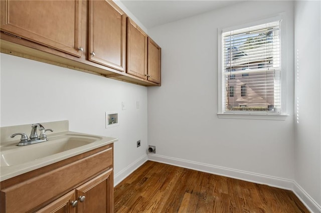 224 Celestial Ridge Dr, Dallas, GA 30132 - laundry room featuring hookup for a washing machine, hookup for an electric dryer, dark wood-style flooring, and cabinet space