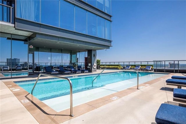 view of pool with a patio