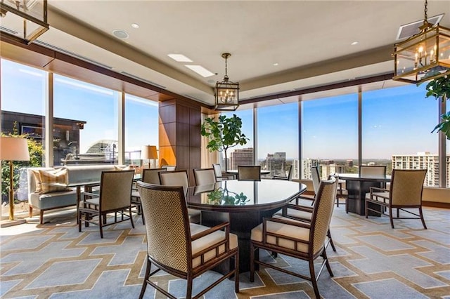 dining area featuring a notable chandelier