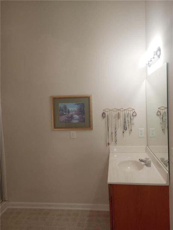 102 Ozark Trl, Canton, GA 30114 - bathroom featuring baseboards and vanity