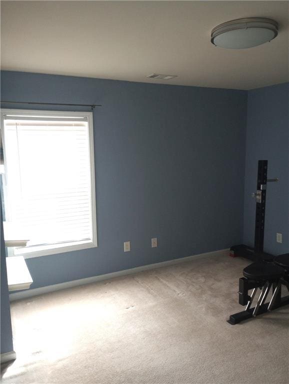 102 Ozark Trl, Canton, GA 30114 - carpeted spare room featuring visible vents and baseboards