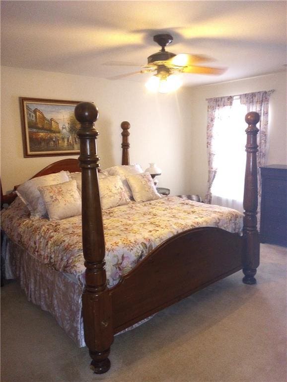 102 Ozark Trl, Canton, GA 30114 - carpeted bedroom featuring ceiling fan