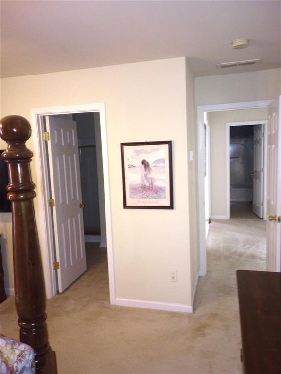 102 Ozark Trl, Canton, GA 30114 - hall featuring light carpet and baseboards