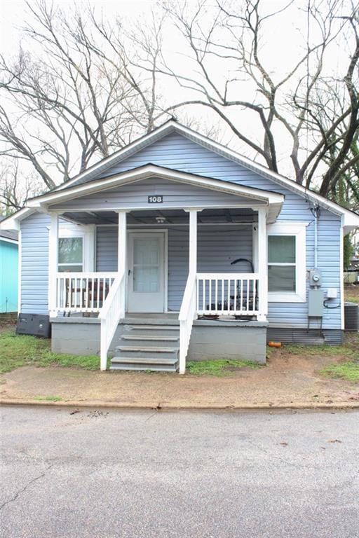 bungalow-style home with a porch