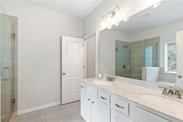 5103 Woodline View Ln, Auburn, GA 30011 - bathroom featuring a stall shower, tile patterned flooring, and double vanity