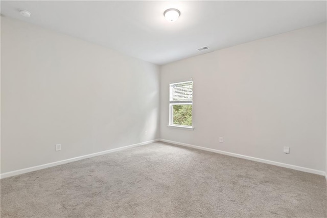 5103 Woodline View Ln, Auburn, GA 30011 - carpeted spare room featuring baseboards and a smoke detector