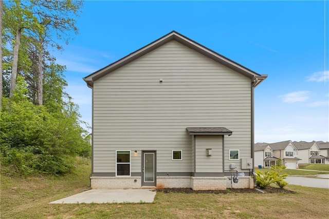 5103 Woodline View Ln, Auburn, GA 30011 - rear view of house featuring a patio area and a lawn