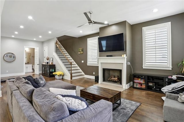 2020 Bixby St SE, Atlanta, GA 30317 - living room featuring stairway, a ceiling fan, a fireplace, recessed lighting, and wood finished floors