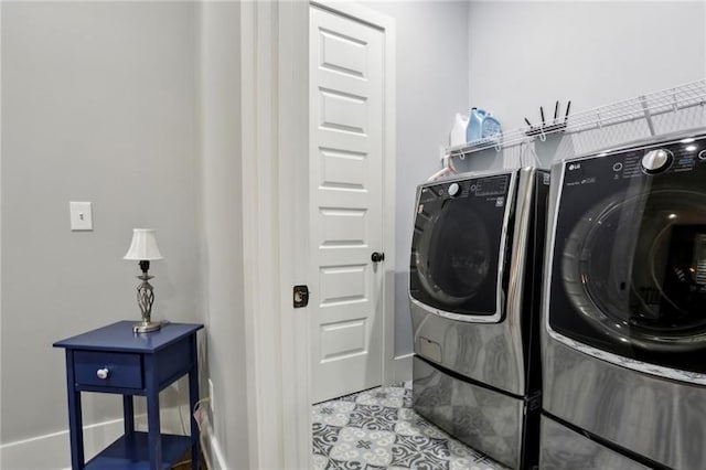 2020 Bixby St SE, Atlanta, GA 30317 - laundry room featuring washing machine and clothes dryer and tile patterned flooring