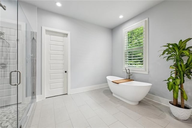 2020 Bixby St SE, Atlanta, GA 30317 - full bath featuring a shower stall, a soaking tub, and recessed lighting