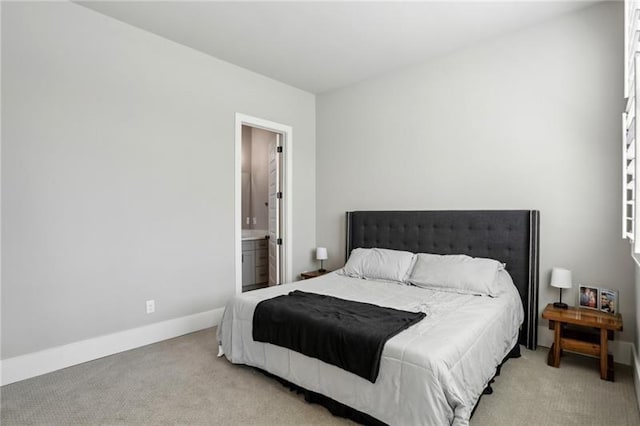 2020 Bixby St SE, Atlanta, GA 30317 - bedroom featuring light colored carpet and ensuite bathroom