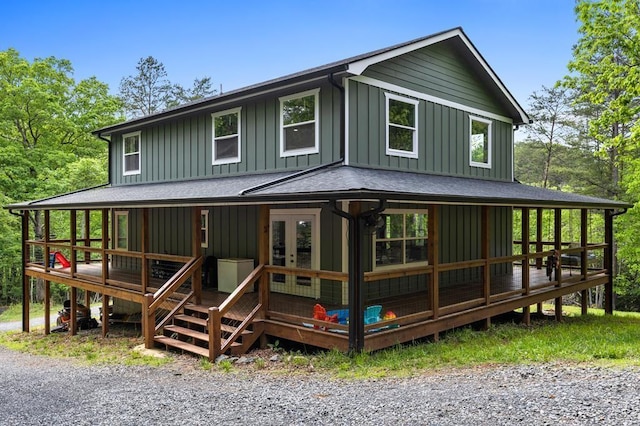 35 Indian Trce, Mineral Bluff, GA 30559 - farmhouse with board and batten siding, french doors, a shingled roof, and a deck