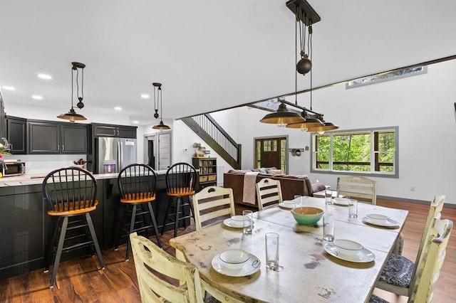35 Indian Trce, Mineral Bluff, GA 30559 - dining space featuring dark wood-style floors, stairs, and recessed lighting