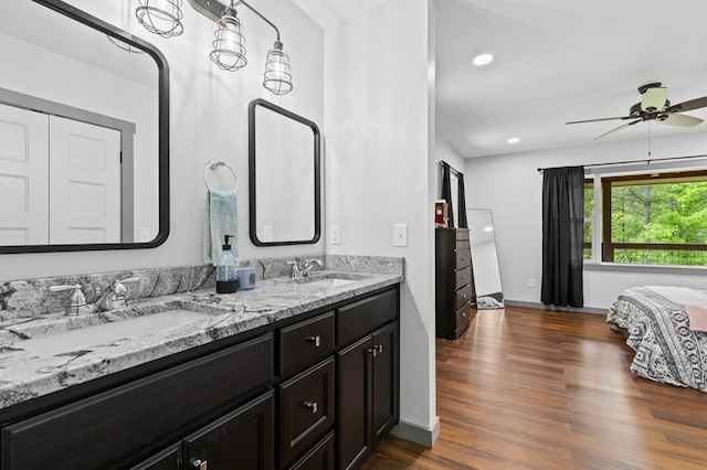 35 Indian Trce, Mineral Bluff, GA 30559 - bathroom featuring wood finished floors, double vanity, a ceiling fan, baseboards, and recessed lighting