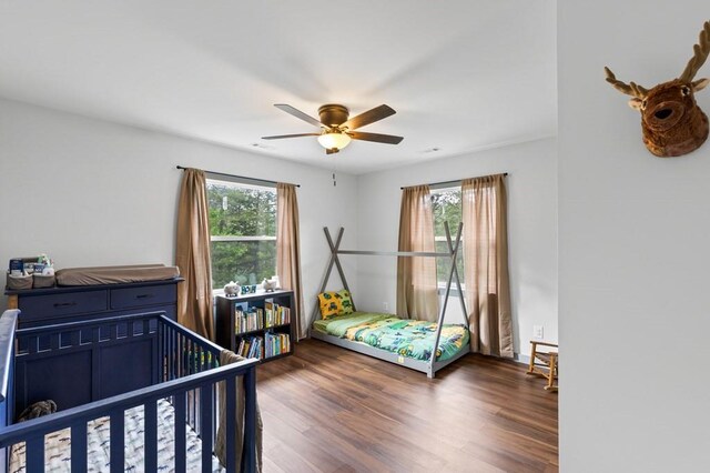 35 Indian Trce, Mineral Bluff, GA 30559 - bedroom featuring multiple windows, wood finished floors, and ceiling fan