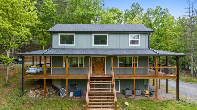 35 Indian Trce, Mineral Bluff, GA 30559 - view of front of home with a shingled roof, stairway, central AC unit, and a porch
