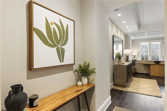 interior space featuring recessed lighting, dark wood-type flooring, and baseboards