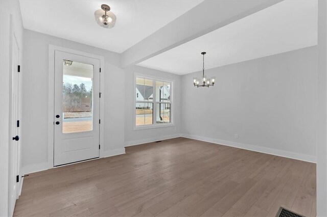 kitchen with white cabinets and light wood-type flooring