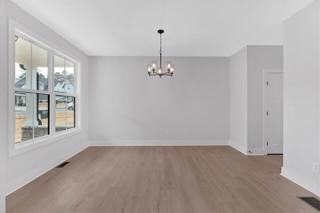 stairway with hardwood / wood-style flooring