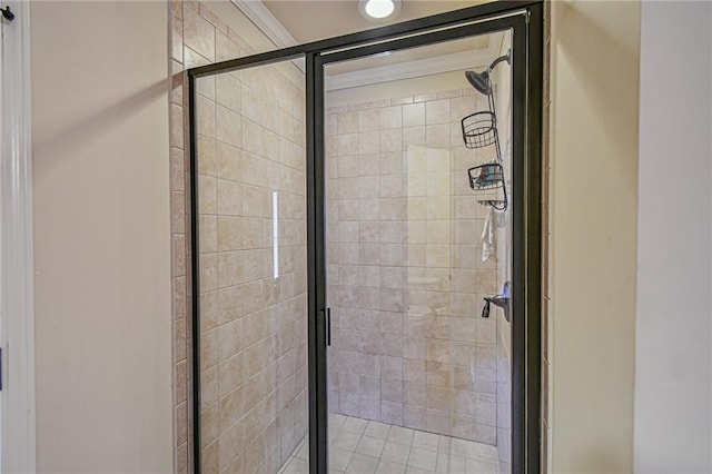 bathroom with a shower with door