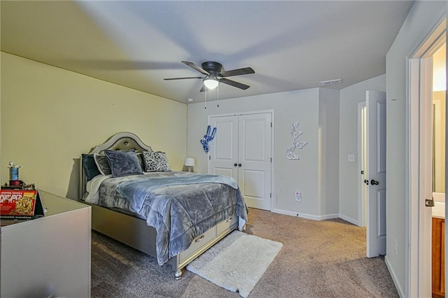 bedroom featuring carpet flooring, a closet, and ceiling fan