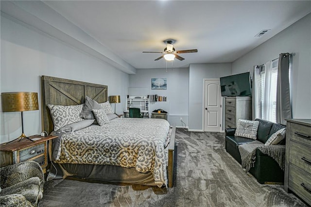 carpeted bedroom featuring ceiling fan