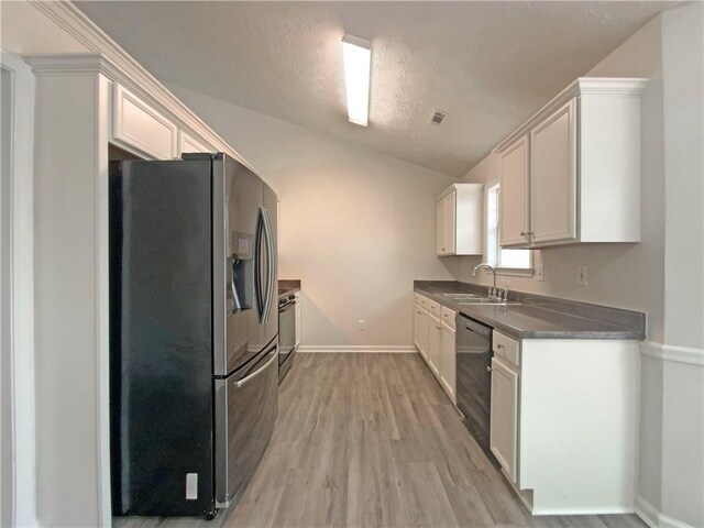 2012 Elm Grove Ln, Hampton, GA 30228 - kitchen featuring dark countertops, a sink, stainless steel fridge with ice dispenser, baseboards, and dishwashing machine