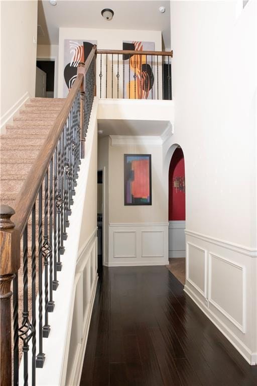 stairway featuring hardwood / wood-style floors