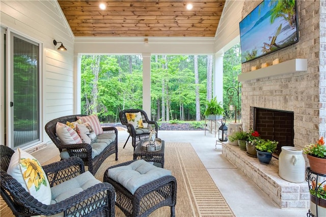 view of patio featuring an outdoor living space with a fireplace