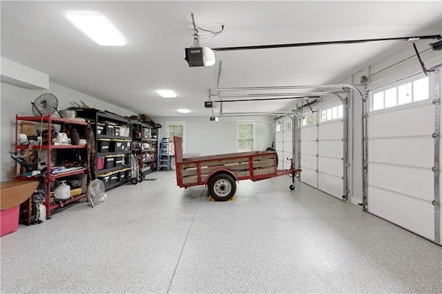 garage featuring a garage door opener