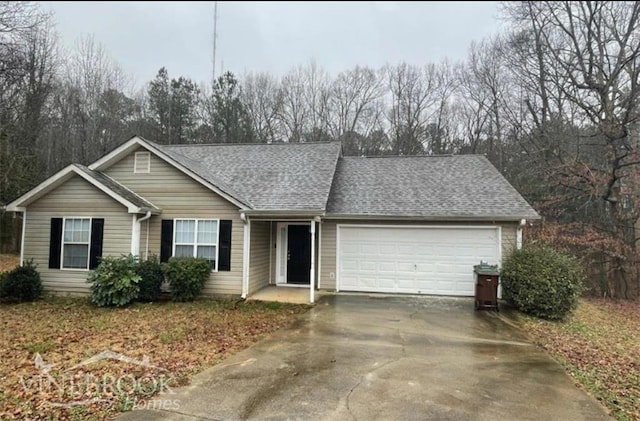 504 Edgewood Trce, Mcdonough, GA 30253 - ranch-style house with an attached garage, driveway, and a shingled roof