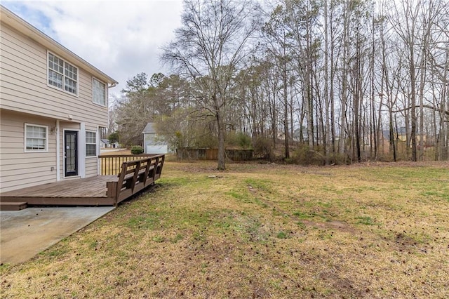 view of yard featuring a deck