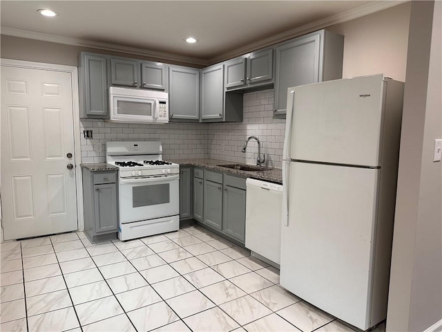 kitchen with gray cabinets, white appliances, crown molding, and a sink