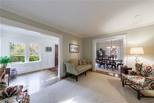 202 Lakeview Ave, Atlanta, GA 30305 - sitting room with a chandelier, wood finished floors, and ornamental molding