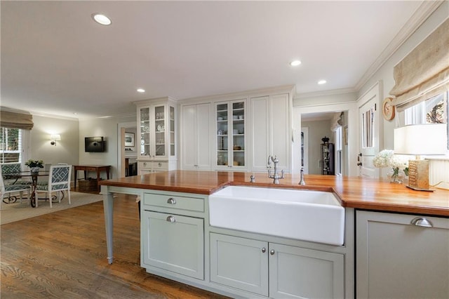 202 Lakeview Ave, Atlanta, GA 30305 - kitchen featuring butcher block counters, recessed lighting, a sink, and crown molding