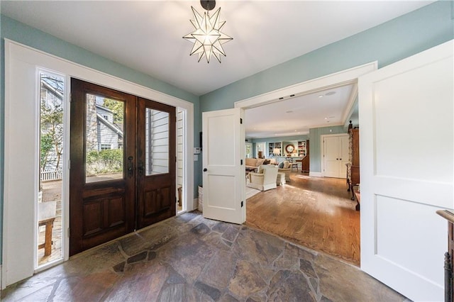 202 Lakeview Ave, Atlanta, GA 30305 - foyer entrance with french doors and stone finish flooring