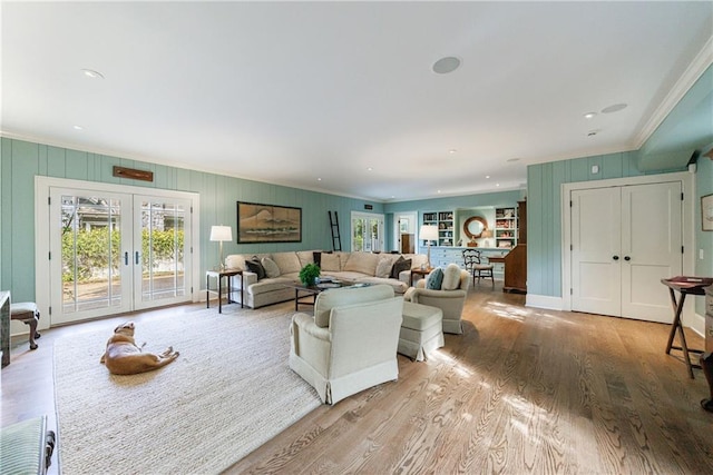 202 Lakeview Ave, Atlanta, GA 30305 - living area with french doors, ornamental molding, and light wood finished floors