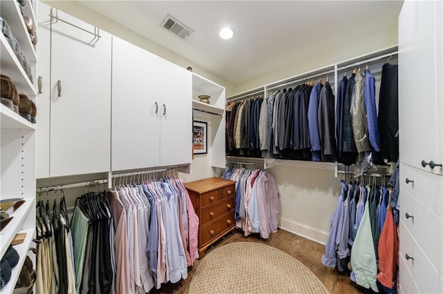 202 Lakeview Ave, Atlanta, GA 30305 - walk in closet featuring visible vents and wood finished floors