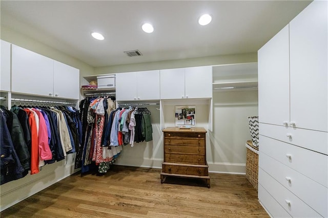 202 Lakeview Ave, Atlanta, GA 30305 - spacious closet featuring visible vents and light wood-style flooring