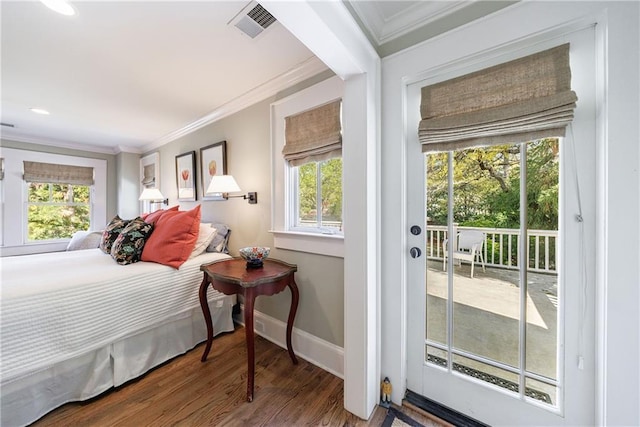 202 Lakeview Ave, Atlanta, GA 30305 - bedroom featuring crown molding, multiple windows, and access to outside