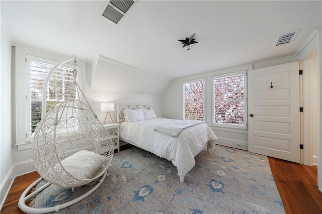 202 Lakeview Ave, Atlanta, GA 30305 - bedroom with visible vents, multiple windows, and wood finished floors