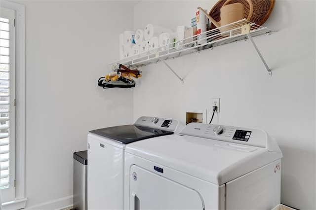 laundry area featuring washing machine and dryer