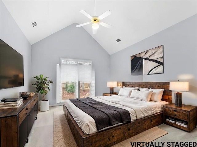 bedroom with ceiling fan, high vaulted ceiling, and light carpet