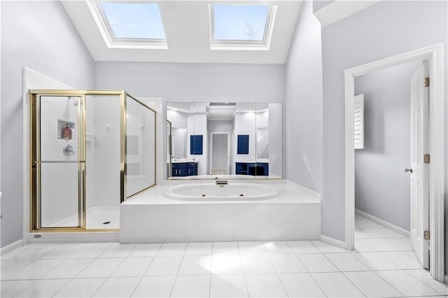 bathroom featuring lofted ceiling with skylight, tile patterned floors, and shower with separate bathtub